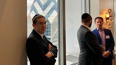 young professional minority groups in the business sector. At left is Shmuel Ben Tzvi.